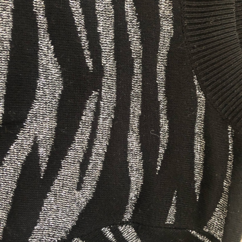 Silver and black sweater in perfect condition